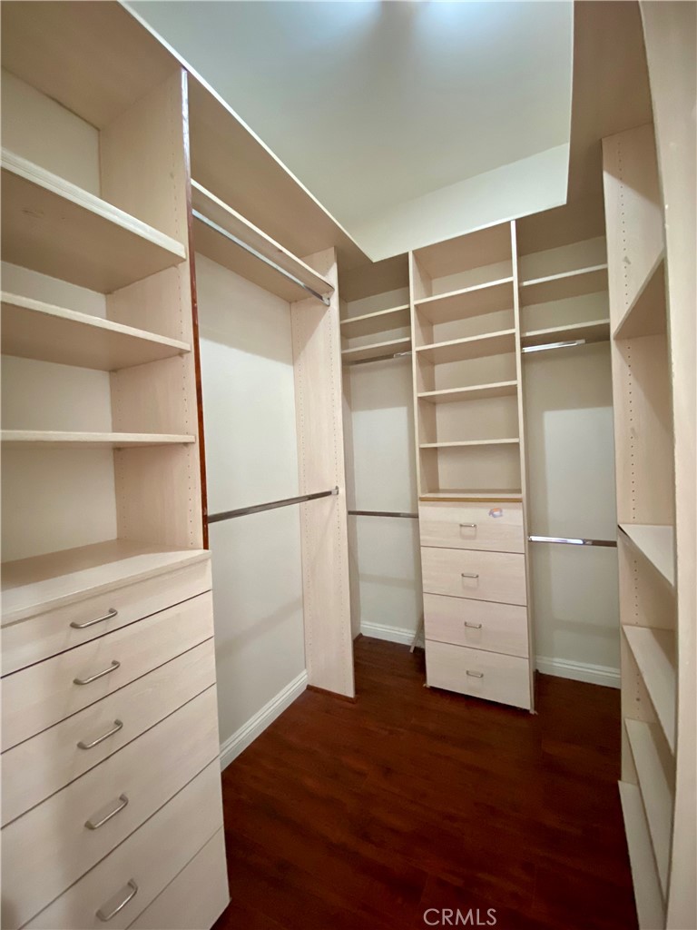 11019 Rives Avenue Downey, CA 90241 - Photo 15 of 35 a view of walk in closet with empty racks