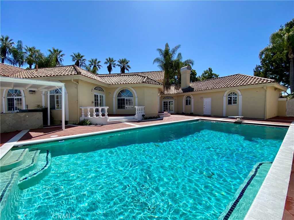 11019 Rives Avenue Downey, CA 90241 - Photo 34 of 35 a front view of house with yard and green space
