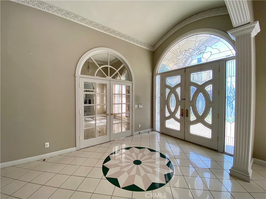 11019 Rives Avenue Downey, CA 90241 - Photo 4 of 35 a view of an entryway with wooden floor