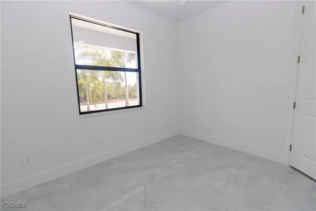 an empty room with window