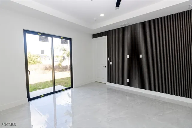 an empty room with windows