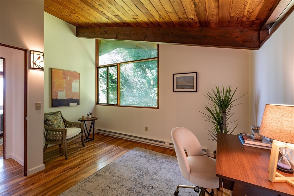 15 Cole Road Williamsburg, MA 01039 - Photo 14 of 35 a workspace with furniture and wooden floor