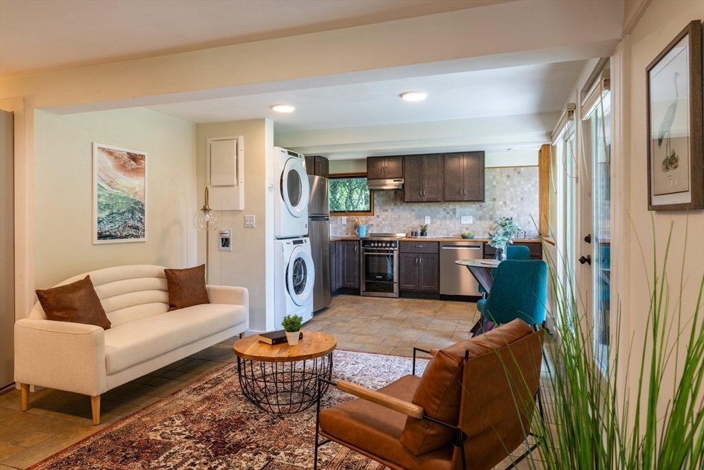 15 Cole Road Williamsburg, MA 01039 - Photo 18 of 35 a living room with furniture and a kitchen