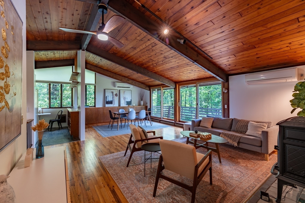 15 Cole Road Williamsburg, MA 01039 - Photo 5 of 35 a living room with furniture next to a large window