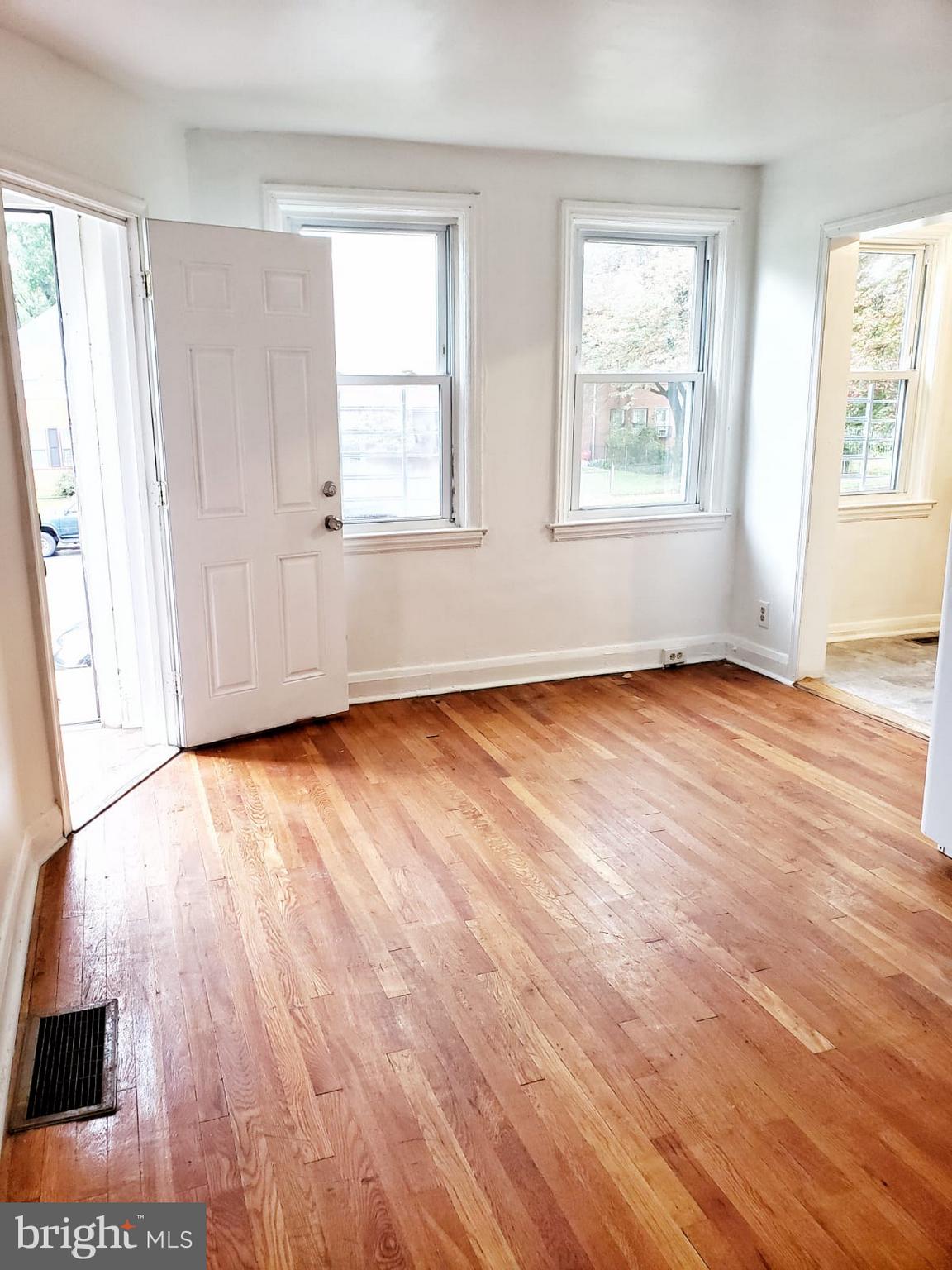 4044 Hilton Road Baltimore, MD 21215 - Photo 3 of 27 refinished wood floors.