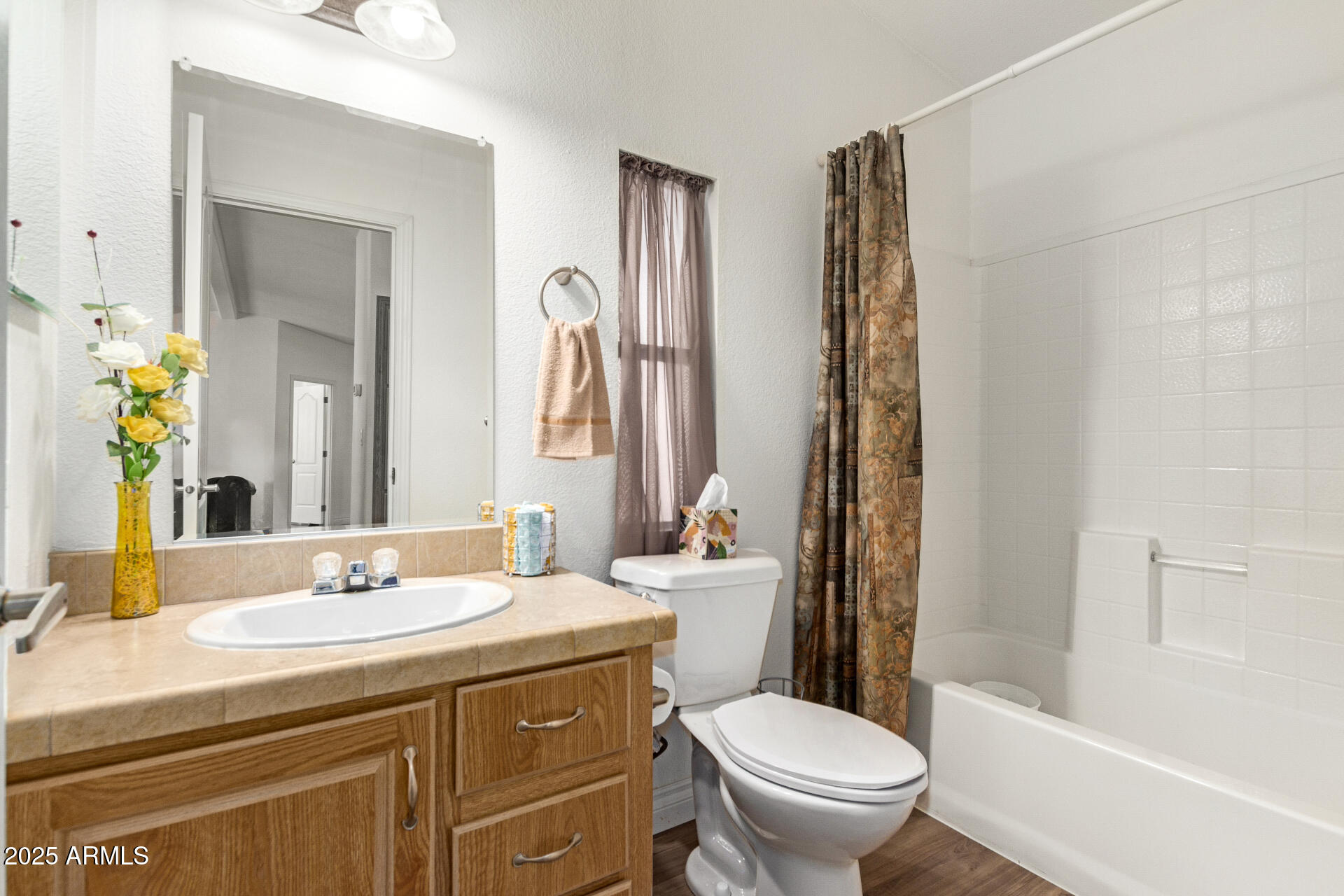 2929 East Main Street, Unit 83 Mesa, AZ 85213 - Photo 21 of 34 a bathroom with a granite countertop sink toilet and shower