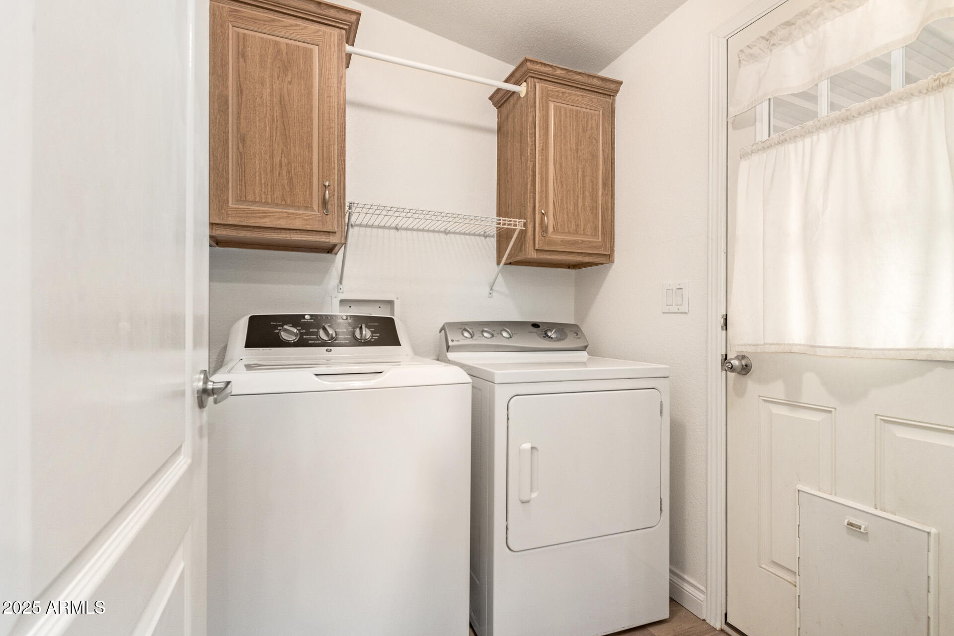 2929 East Main Street, Unit 83 Mesa, AZ 85213 - Photo 22 of 34 a utility room with dryer and washer