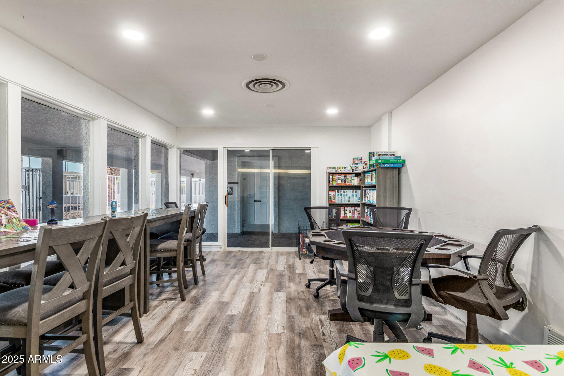 2929 East Main Street, Unit 83 Mesa, AZ 85213 - Photo 27 of 34 a view of a dining room with furniture and wooden floor