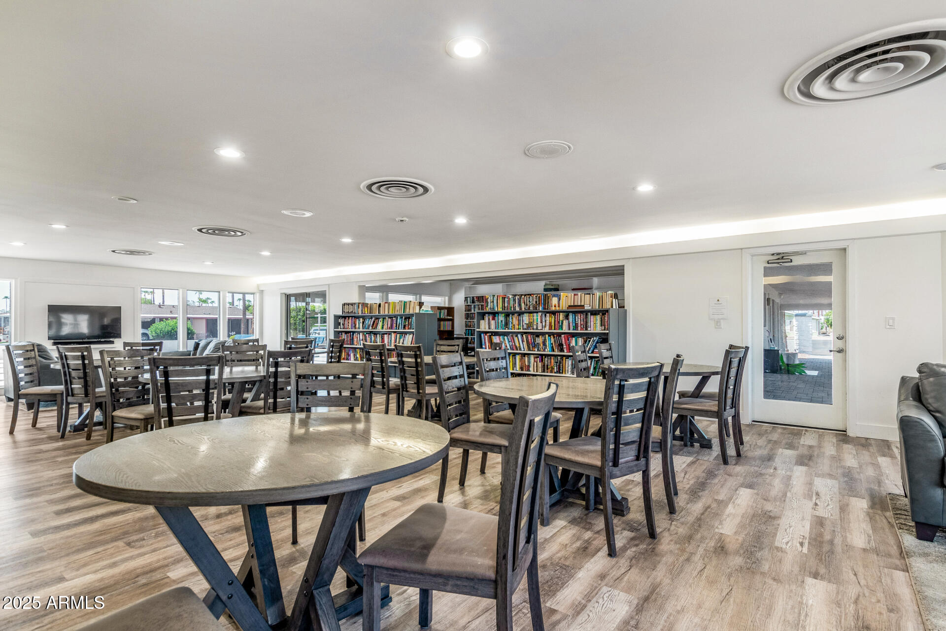 2929 East Main Street, Unit 83 Mesa, AZ 85213 - Photo 28 of 34 a view of a dining room with furniture and wooden floor