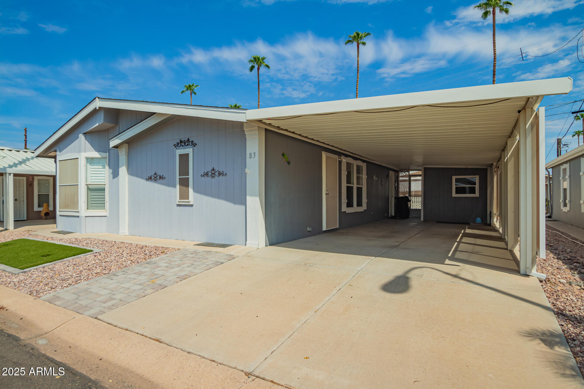 2929 East Main Street, Unit 83 Mesa, AZ 85213 - Photo 2 of 34 a house view with a outdoor space