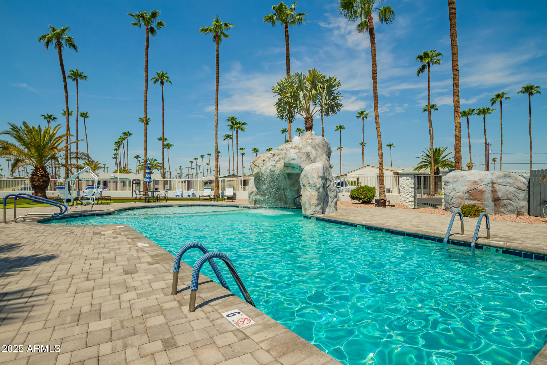 2929 East Main Street, Unit 83 Mesa, AZ 85213 - Photo 32 of 34 a view of yard and swimming pool