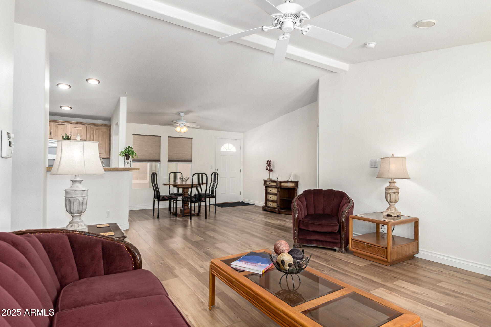2929 East Main Street, Unit 83 Mesa, AZ 85213 - Photo 5 of 34 a living room with furniture and a chandelier