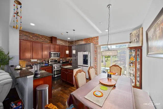 a living room with furniture a flat screen tv and a large window