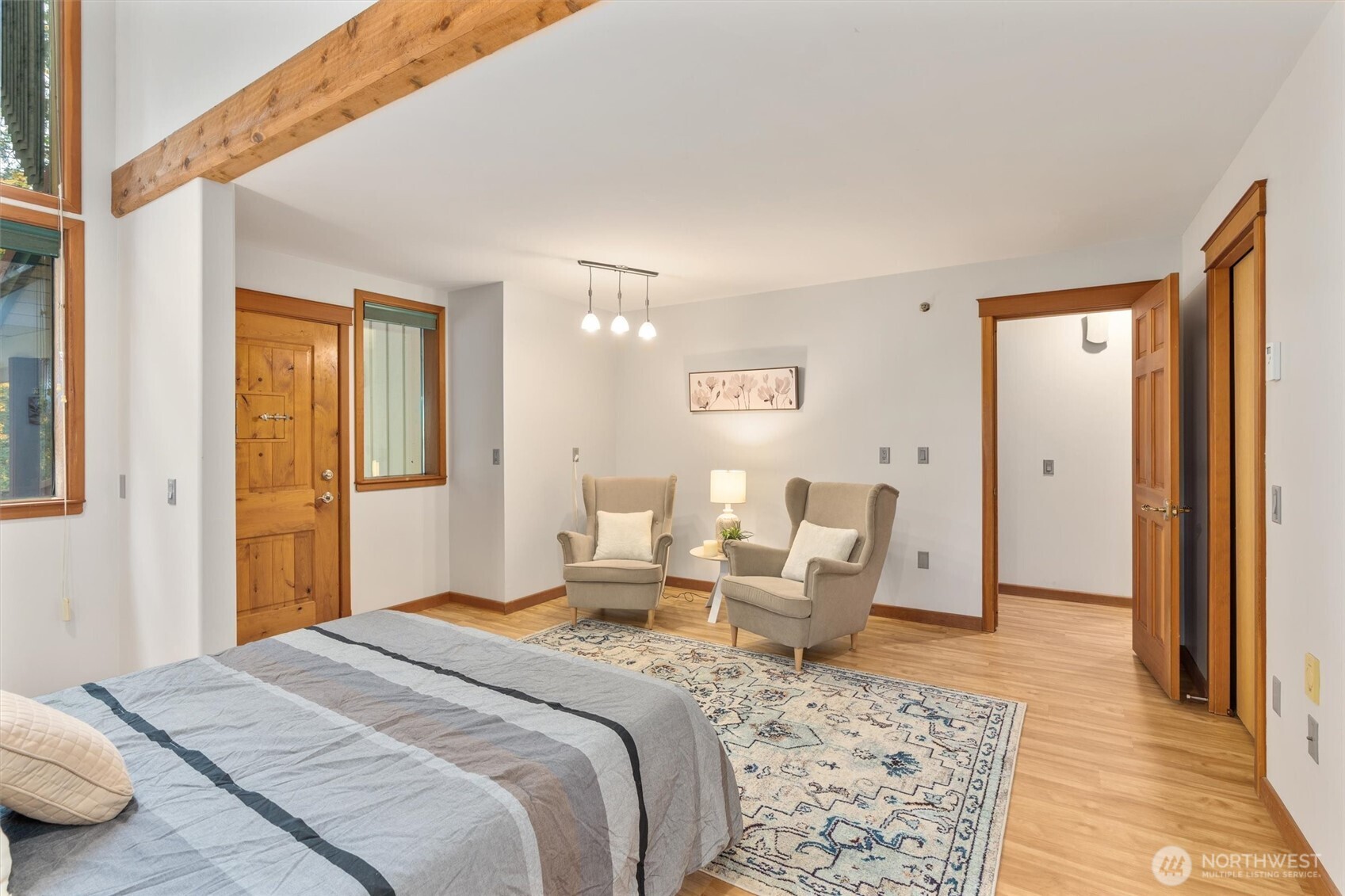 14012 Ingraham Road Monroe, WA 98272 - Photo 15 of 40 a bedroom with a bed and wooden floor