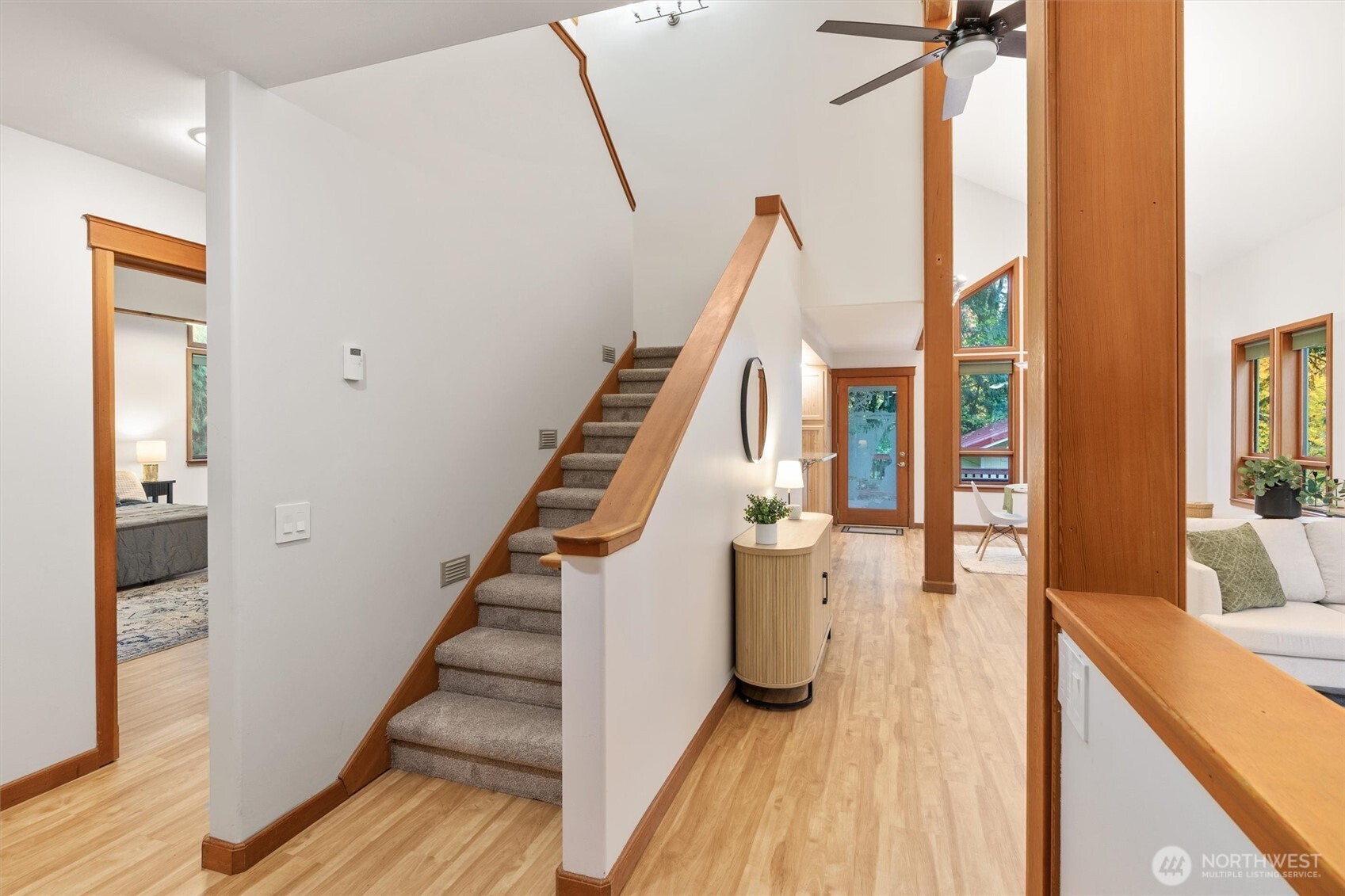 14012 Ingraham Road Monroe, WA 98272 - Photo 19 of 40 a view of a hallway with wooden floor and staircase