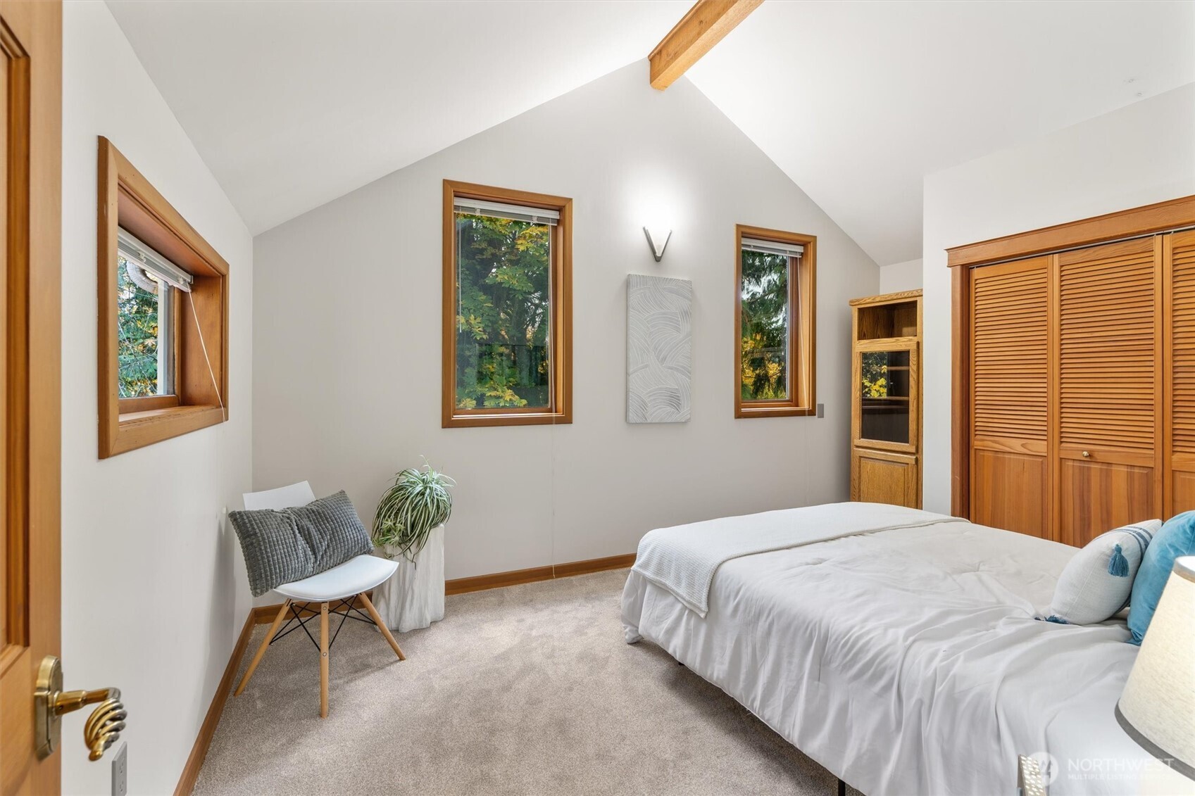 14012 Ingraham Road Monroe, WA 98272 - Photo 23 of 40 a bedroom with a bed and wooden floor