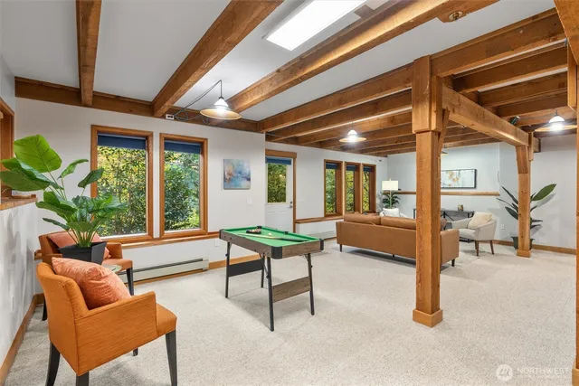 a building outdoor space with patio furniture and potted plants