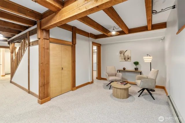 a living room with furniture and a table