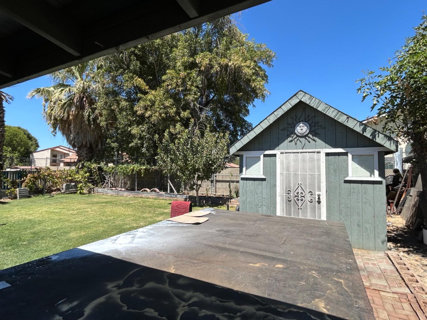 355 J Street Mendota, CA 93640 - Photo 18 of 21 a front view of a house with a yard