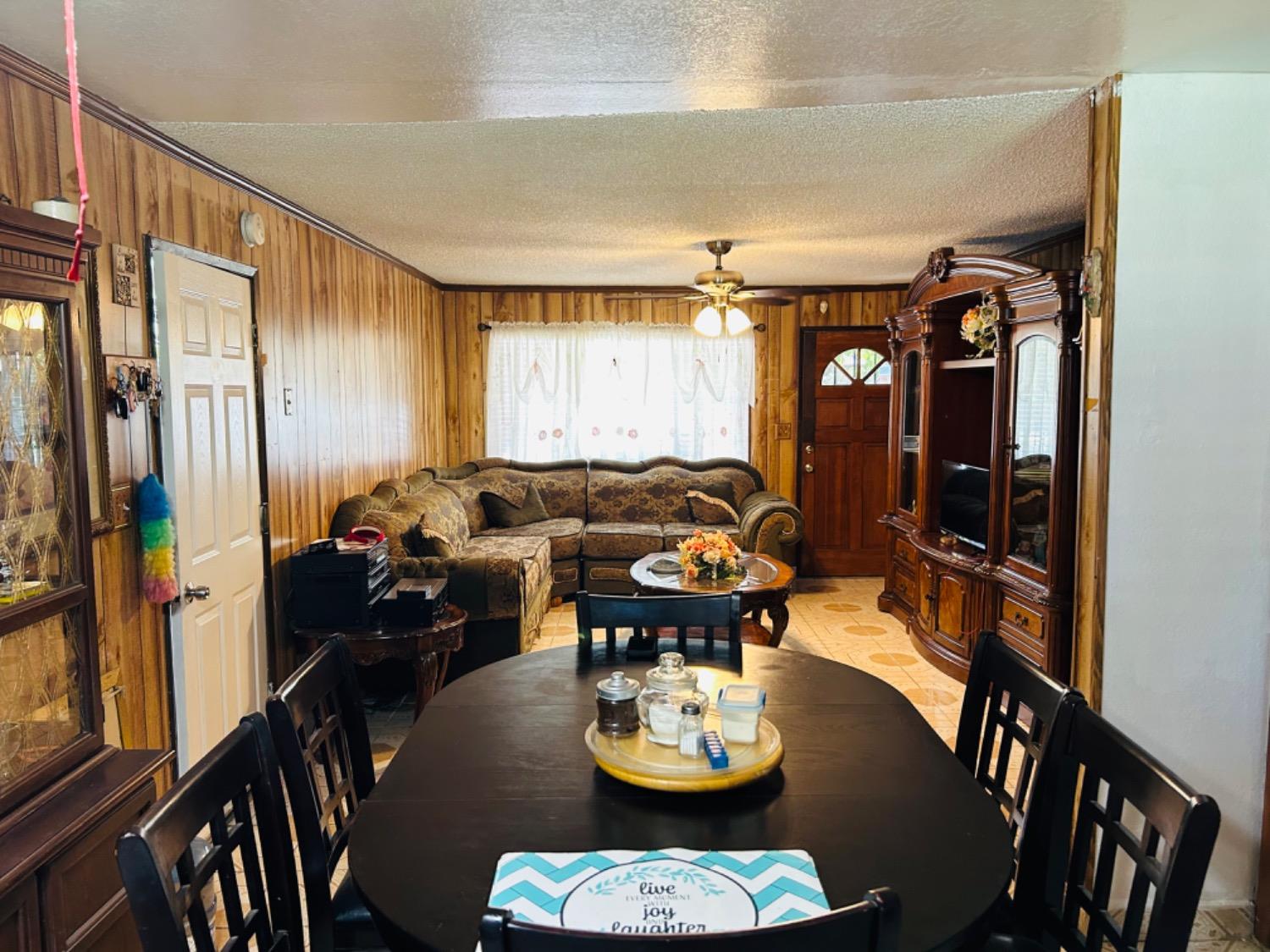 355 J Street Mendota, CA 93640 - Photo 10 of 21 a living room with furniture and a window
