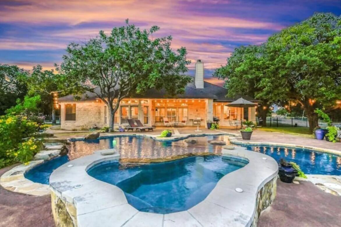 413 Breakaway Road Cedar Park, TX 78613 - Photo 1 of 21 Integrated pool / spa with a patio area