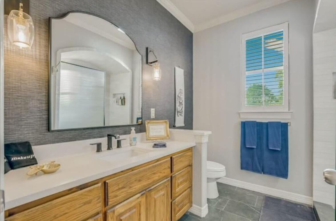 413 Breakaway Road Cedar Park, TX 78613 - Photo 11 of 21 Bathroom with vanity and crown molding