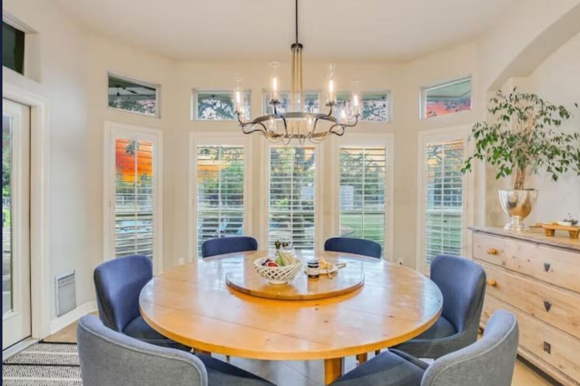 413 Breakaway Road Cedar Park, TX 78613 - Photo 19 of 21 Dining space with a chandelier