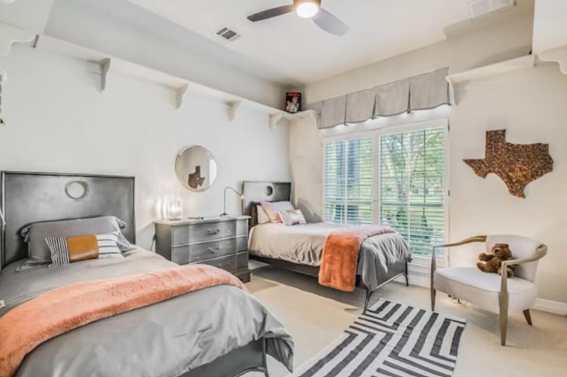 413 Breakaway Road Cedar Park, TX 78613 - Photo 20 of 21 Carpeted bedroom with ceiling fan