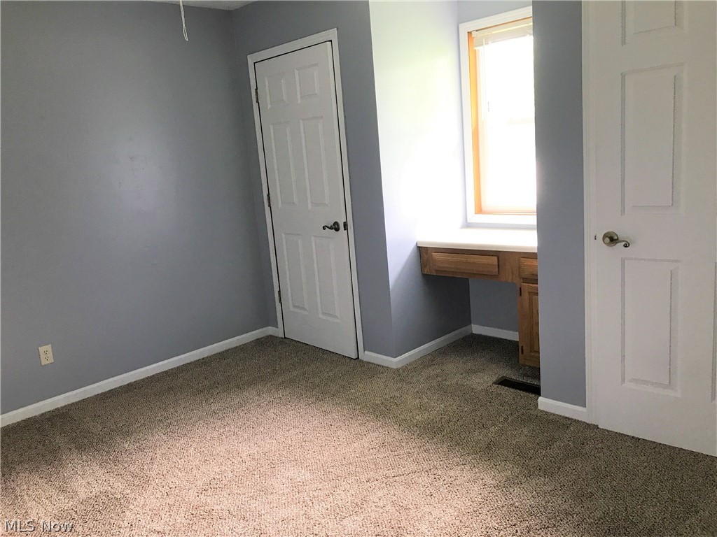 55101 Iowa Road Cumberland, OH 43732 - Photo 22 of 30 2nd large bedroom a mirror image of the other.