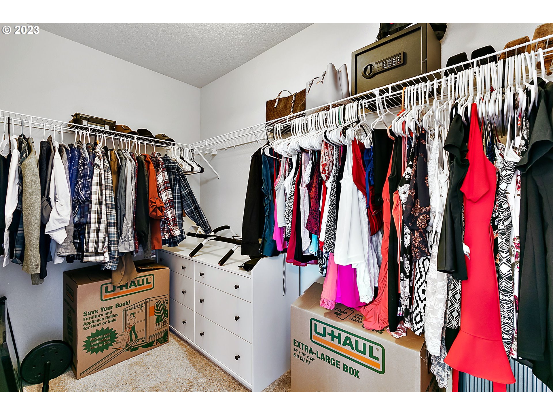 298 North 34th Court Ridgefield, WA 98642 - Photo 24 of 36 a view of walk in closet with clothes