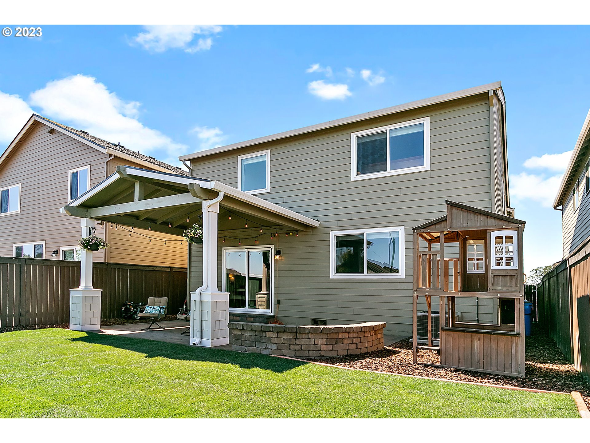 298 North 34th Court Ridgefield, WA 98642 - Photo 33 of 36 a view of a house with a patio