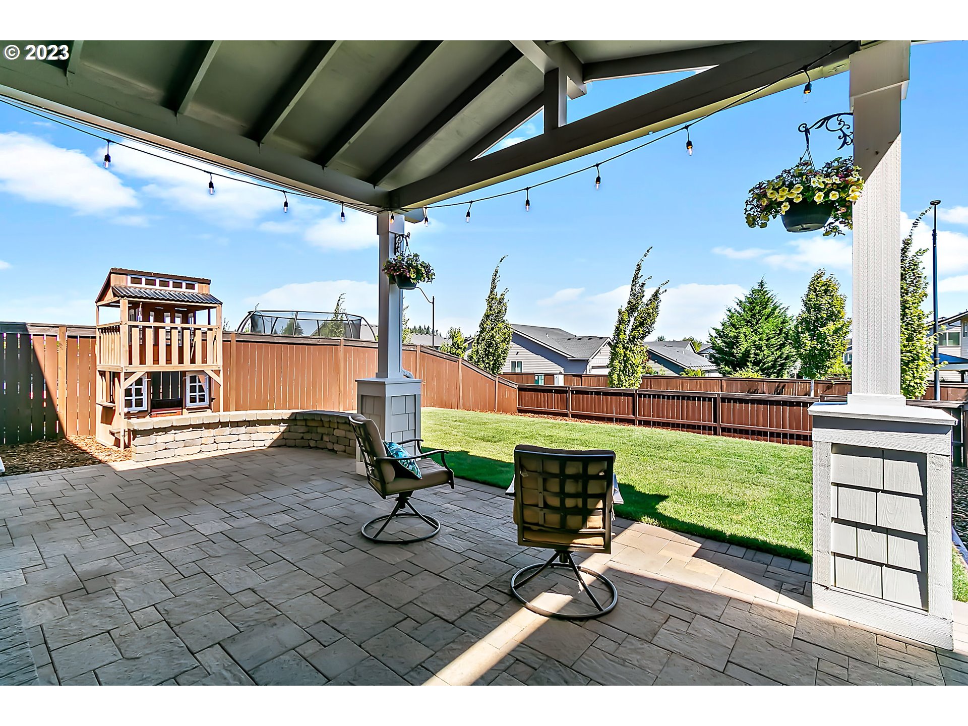 298 North 34th Court Ridgefield, WA 98642 - Photo 34 of 36 a view of a porch with furniture and a yard