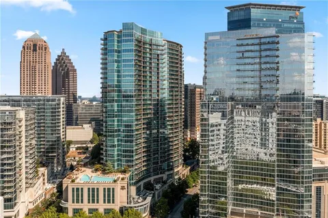 a view of a city with tall buildings
