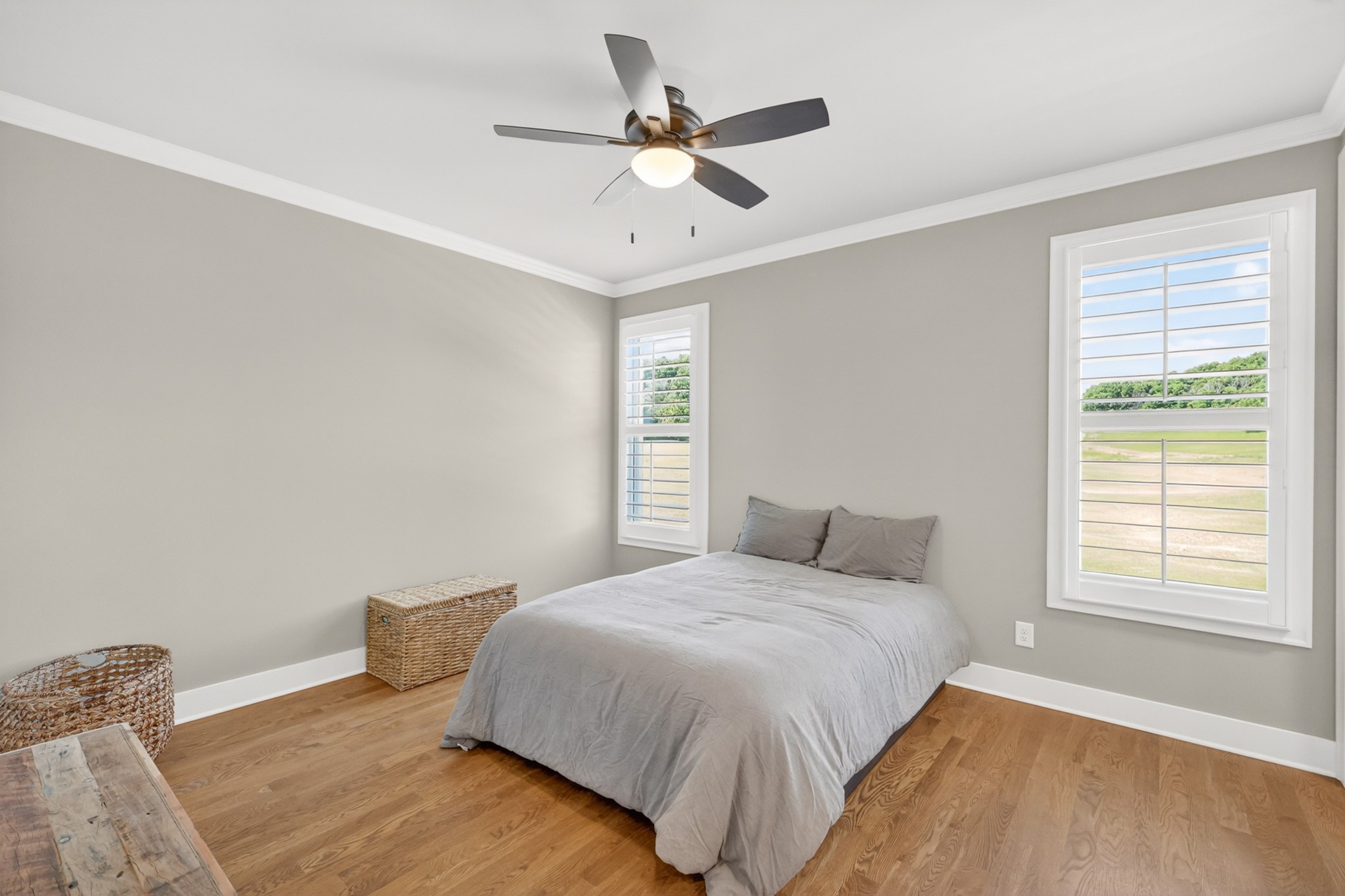 1176 Iron Bridge Road Columbia, TN 38401 - Photo 35 of 53 a bedroom with a bed and a large window with wooden floor