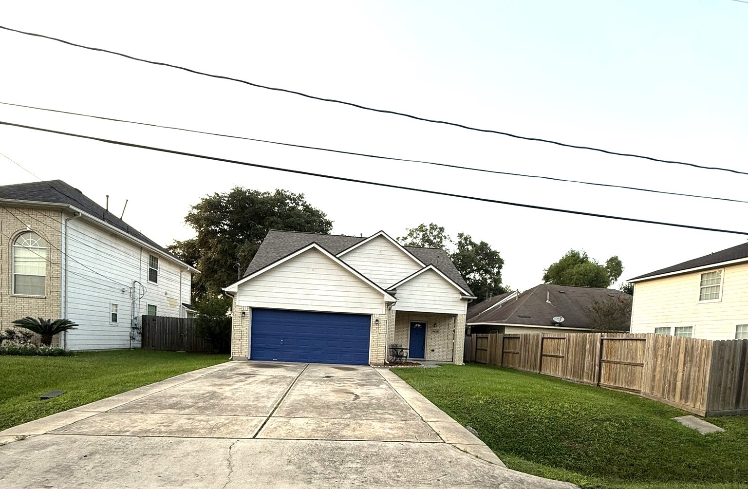 9429 Lambright Road Houston, TX 77075 - Photo 40 of 40 Street view of this 4-bedroom home features a compact facade that hides an expansive footprint.