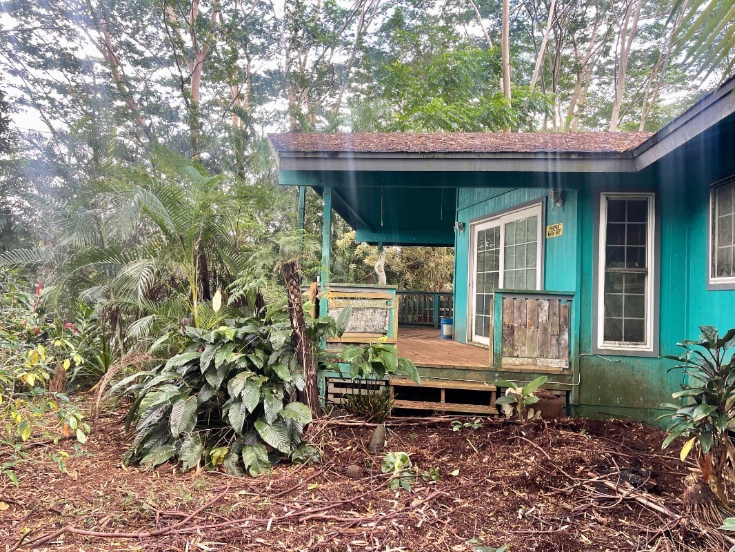6296 Olohena Road Kapaa, HI 96746 - Photo 22 of 30 a view of a house with a yard and sitting area