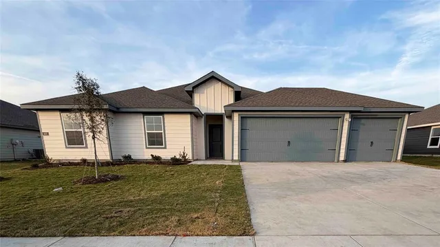 front view of a house with yard