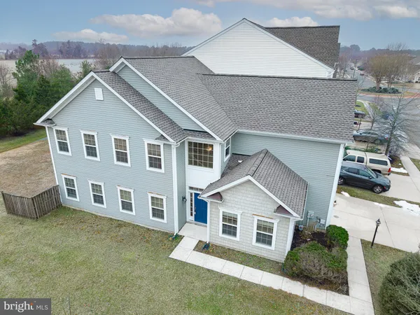a view of a yard in front of house