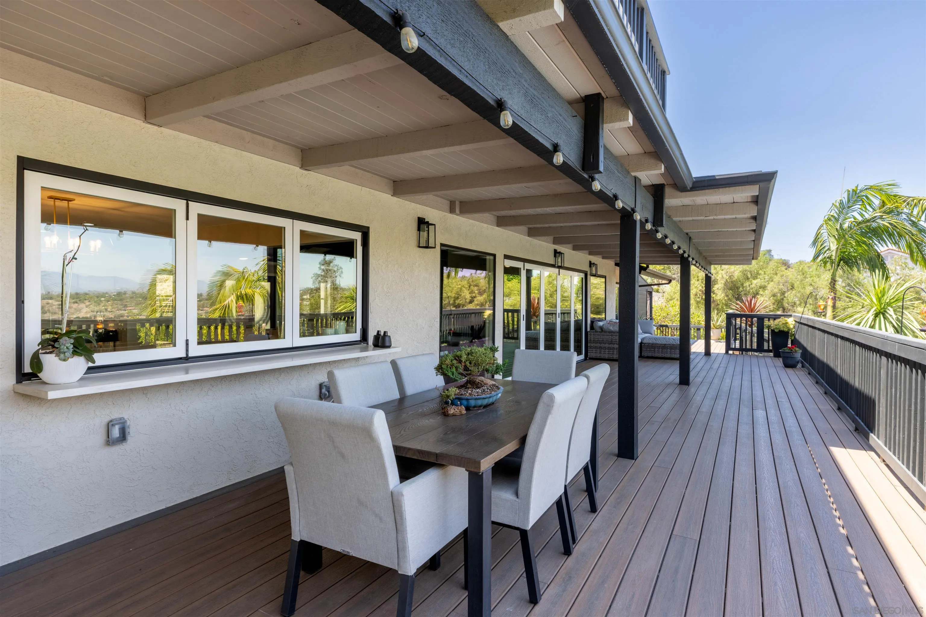 521 Rancho Camino Fallbrook, CA 92028 - Photo 46 of 72 a view of a dining room with furniture window and wooden floor