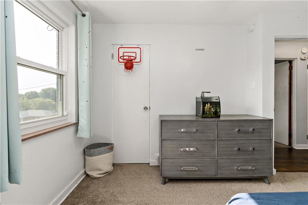 12219 Herold Drive Irwin, PA 15642 - Photo 15 of 28 a room with a cabinet and a window