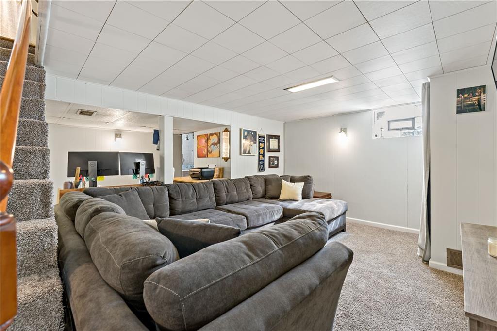 12219 Herold Drive Irwin, PA 15642 - Photo 16 of 28 a living room with furniture and a couch