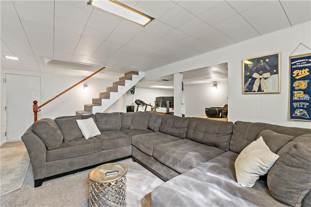 12219 Herold Drive Irwin, PA 15642 - Photo 17 of 28 a living room with furniture and a couch