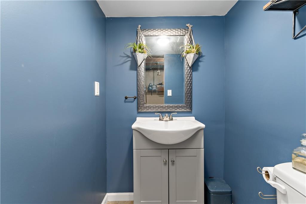 12219 Herold Drive Irwin, PA 15642 - Photo 20 of 28 a bathroom with a sink and a mirror