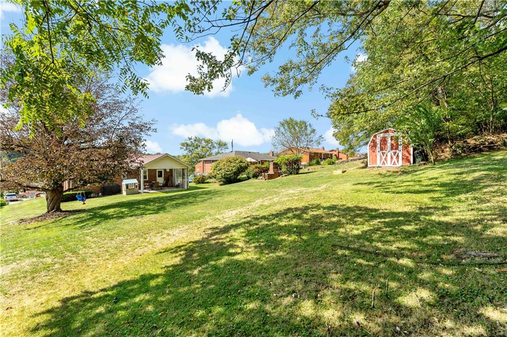 12219 Herold Drive Irwin, PA 15642 - Photo 25 of 28 a view of a house with a big yard