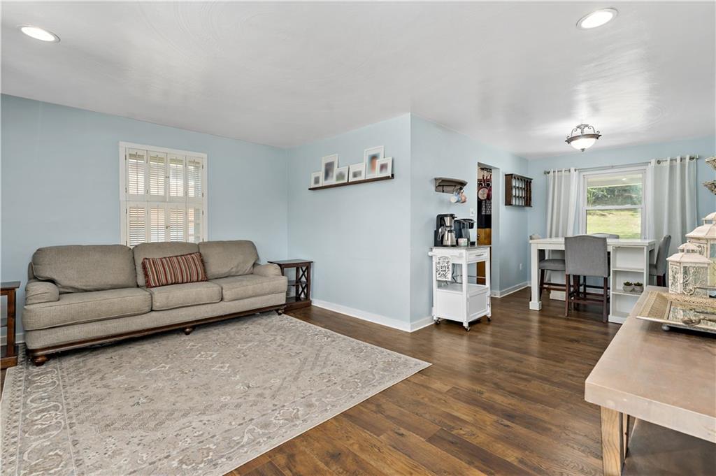 12219 Herold Drive Irwin, PA 15642 - Photo 3 of 28 a living room with furniture and wooden floor