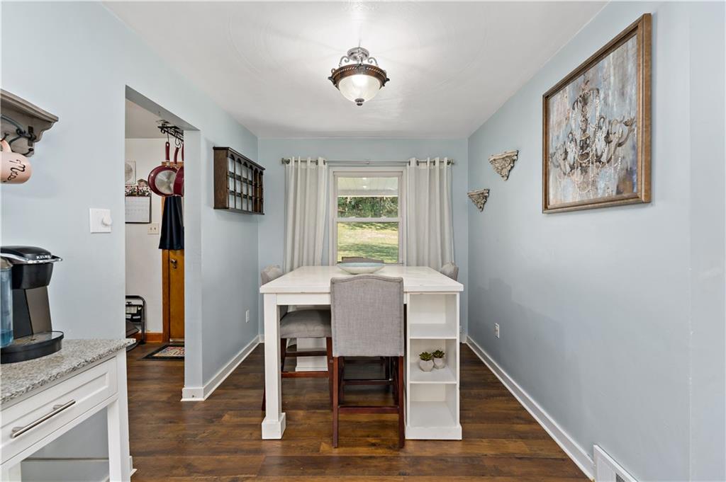 12219 Herold Drive Irwin, PA 15642 - Photo 6 of 28 a view of a workspace with furniture window and wooden floor