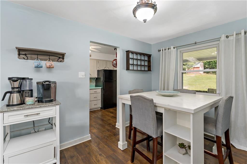 12219 Herold Drive Irwin, PA 15642 - Photo 7 of 28 a view of a dining room with furniture and a window