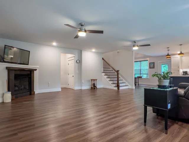 a kitchen with stainless steel appliances a sink dishwasher stove and refrigerator