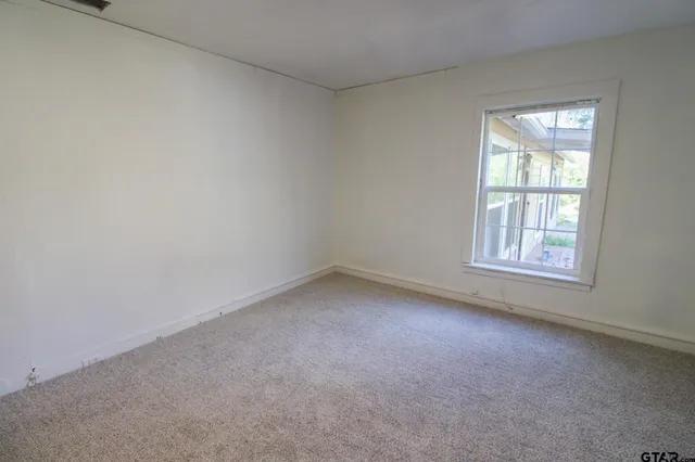 an empty room with a window