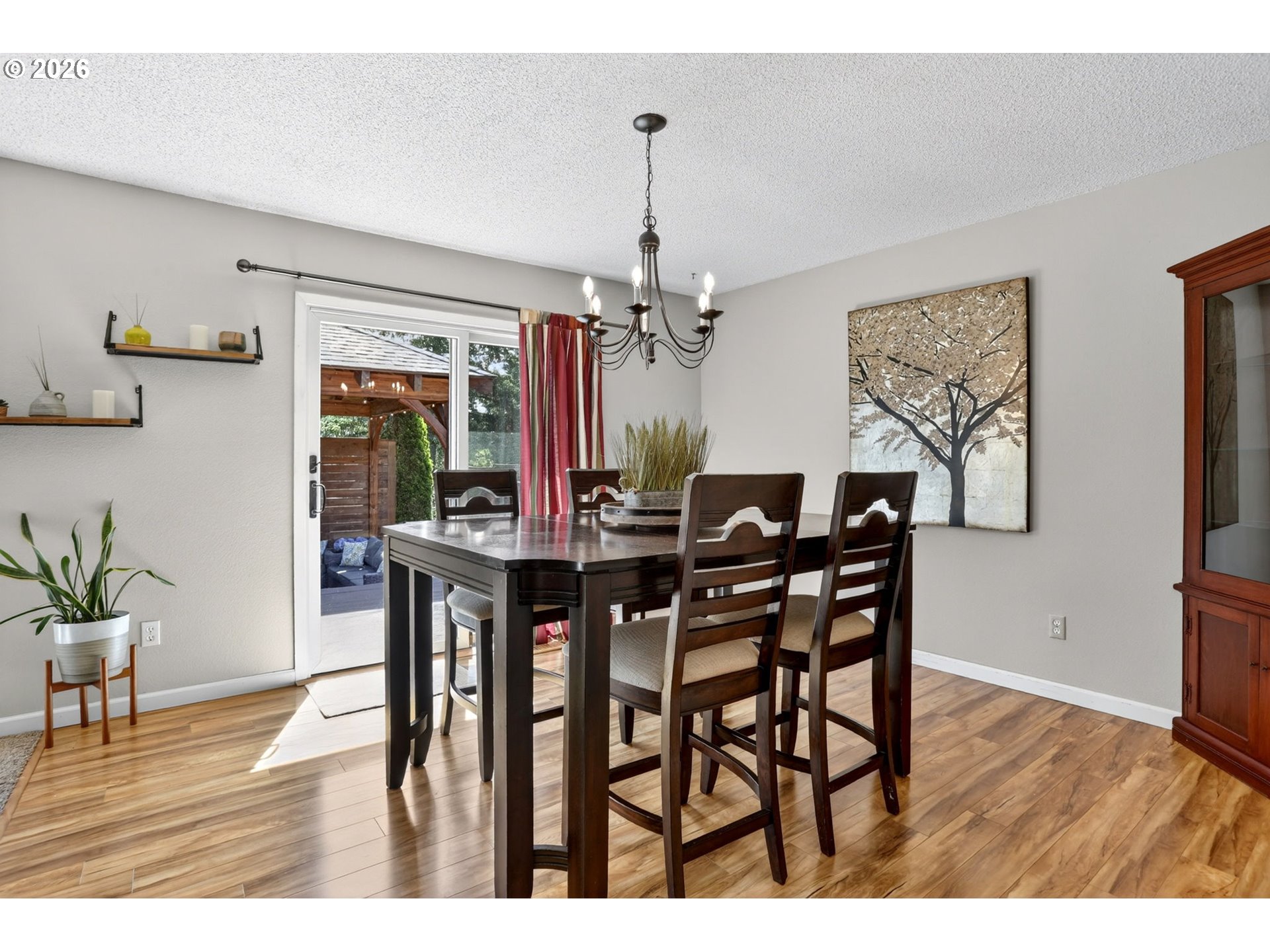 1776 Southeast 114th Place Portland, OR 97216 - Photo 26 of 47 a view of a dining room with furniture and wooden floor